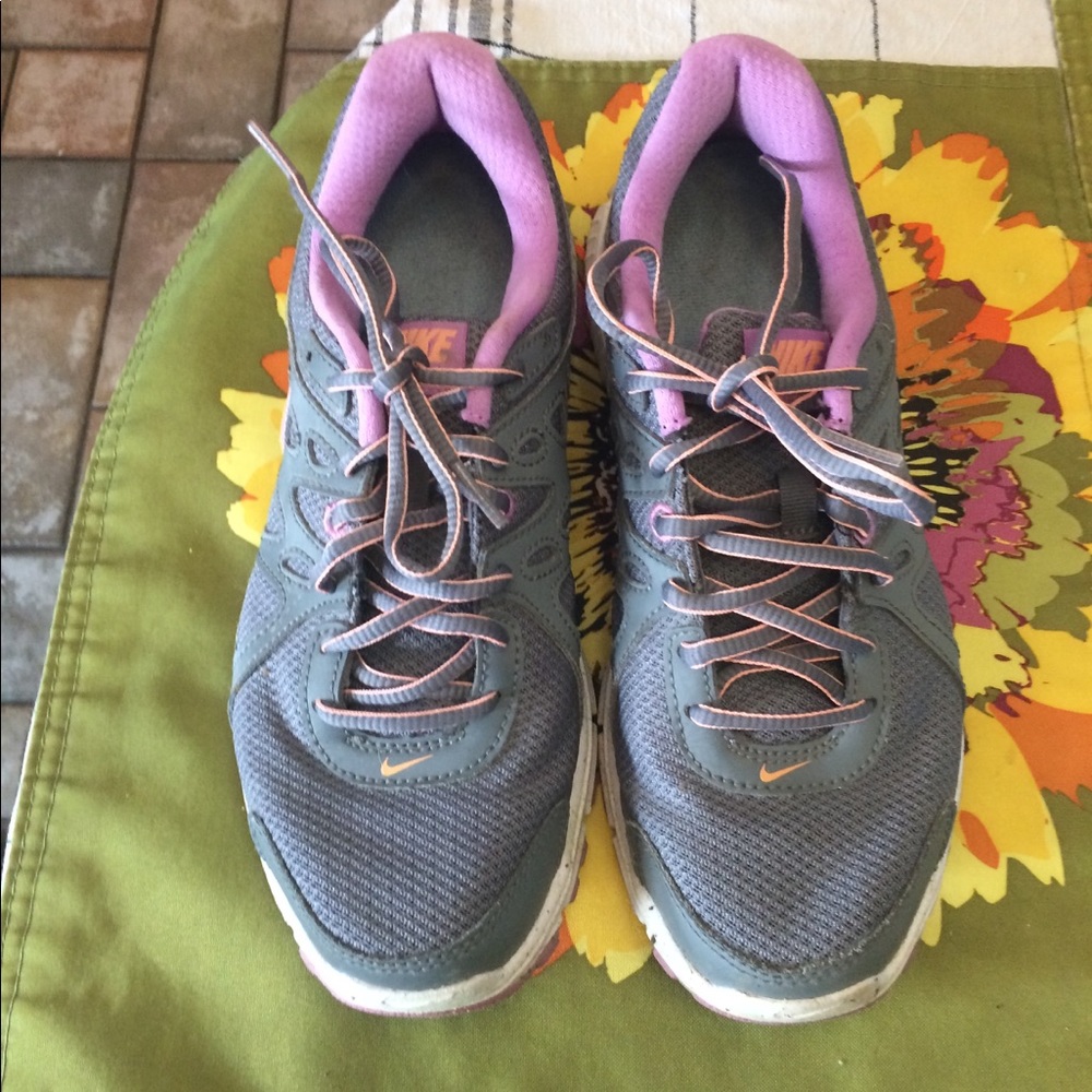 Gently used ladies Nike revolution tennis shoes